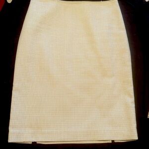 TEENFLO skirt size 8. Beige with subtle accents.  Two small slits at rear. Lined